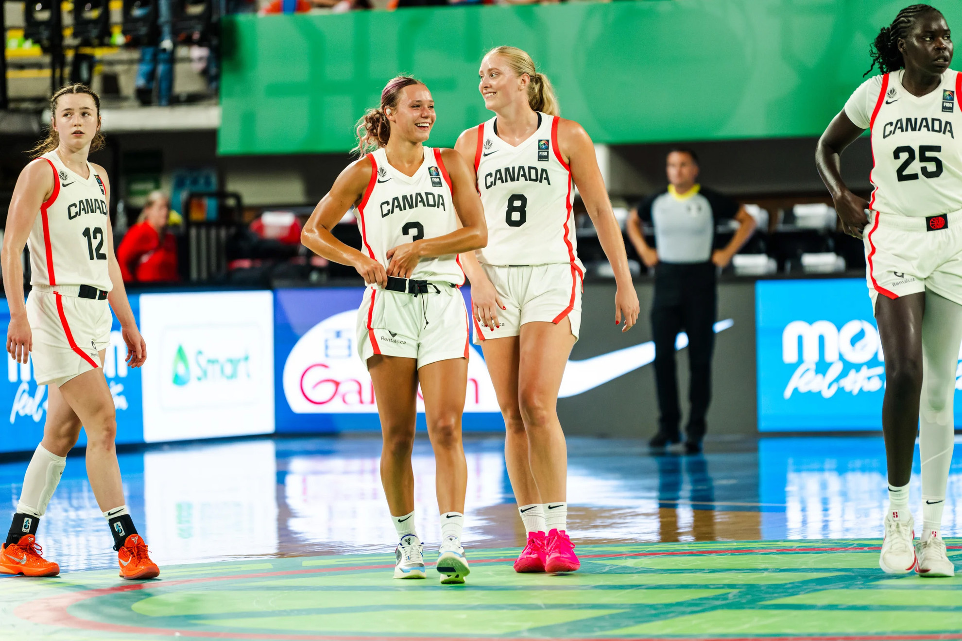 Delaney Gibb chats with a teammate during Canada's game against Senegal.