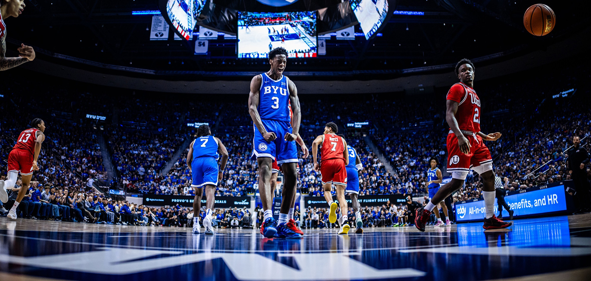 BYU's AJ Dybantsa celebrates following a dunk in a win over rival Utah.