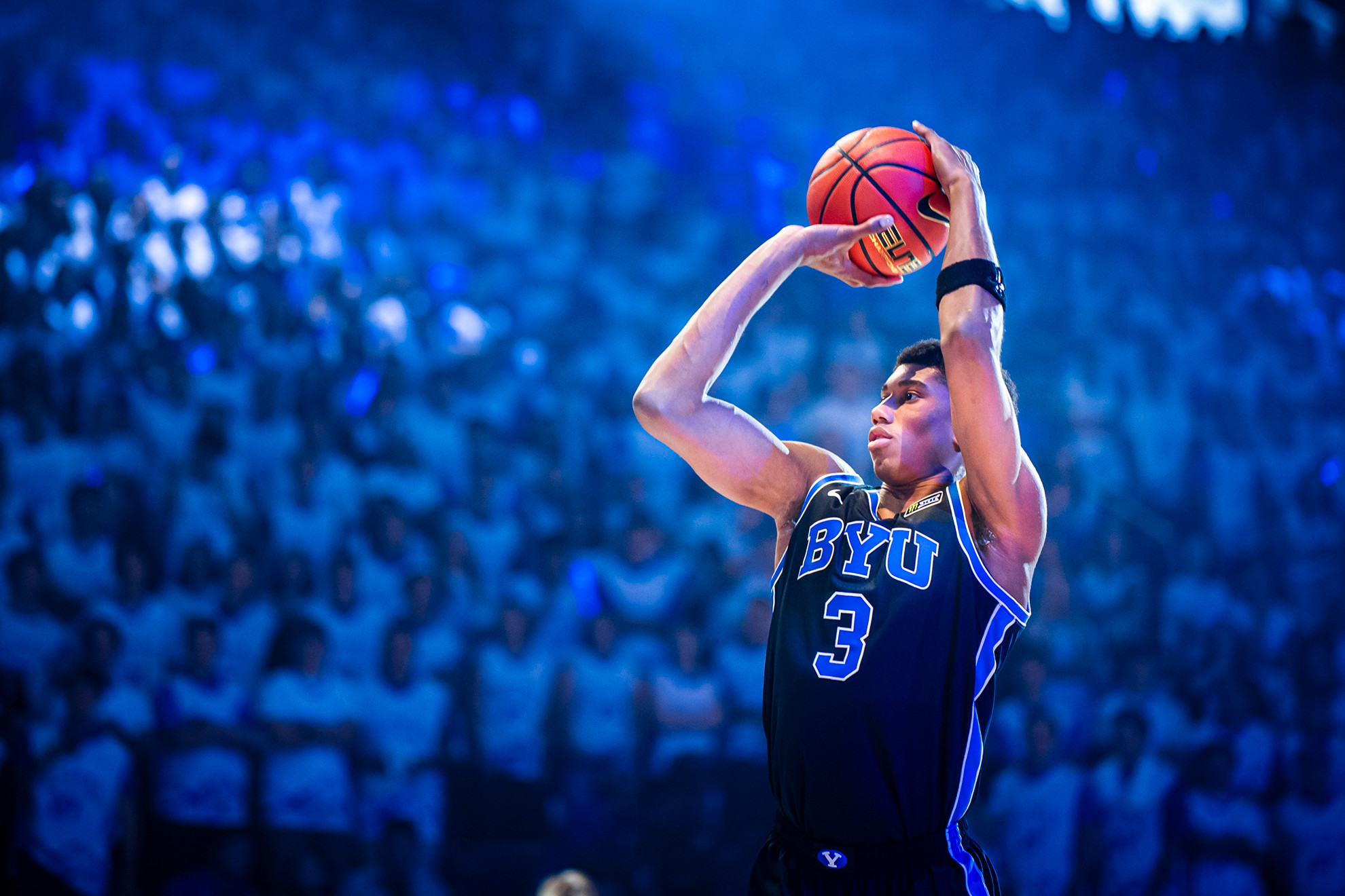Bruce Branch III participates in a 3-point contest at Marriott Madness.