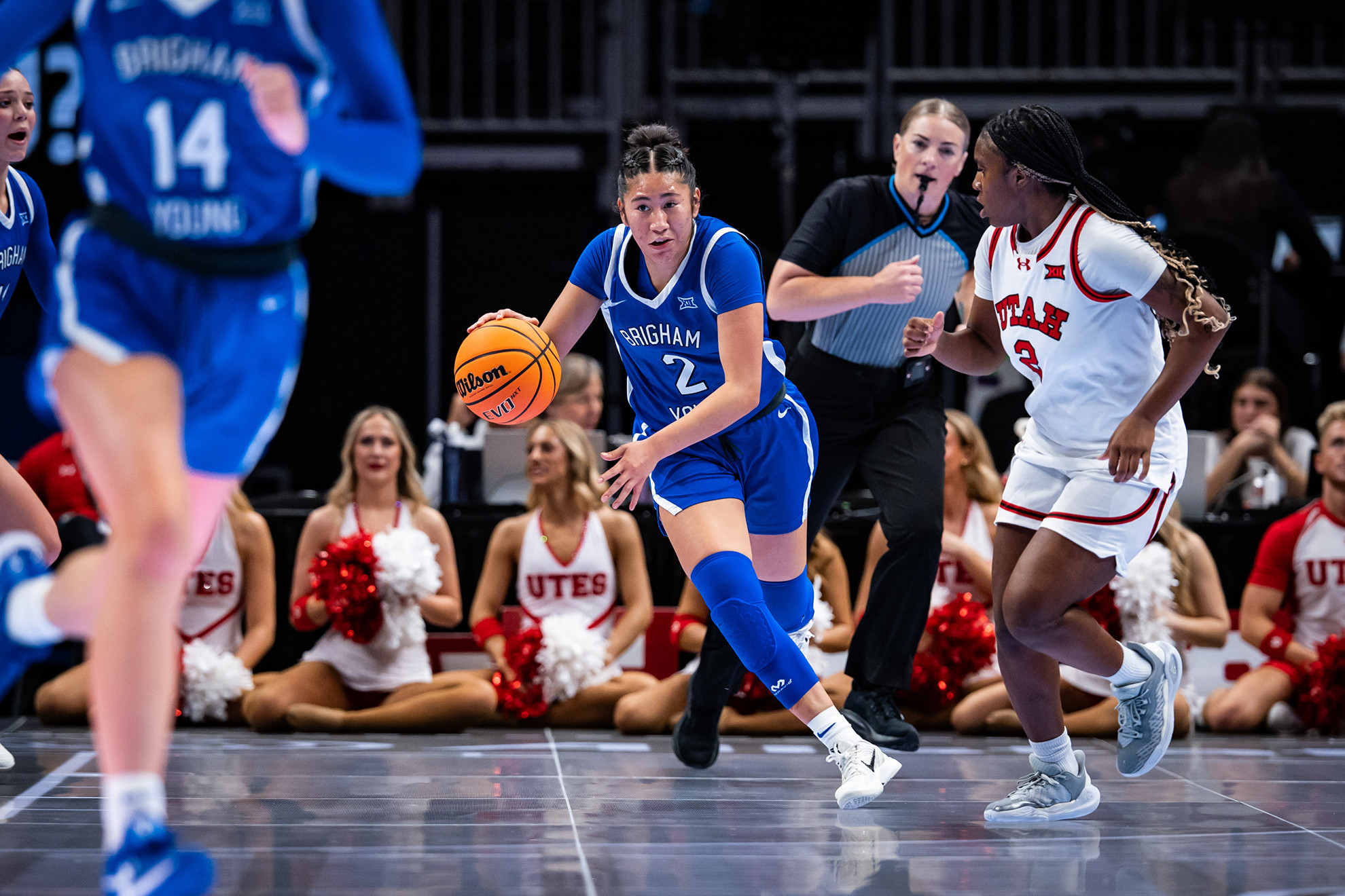 Sydney Benally dribbles up the court during a BYU women's basketball game against Utah.