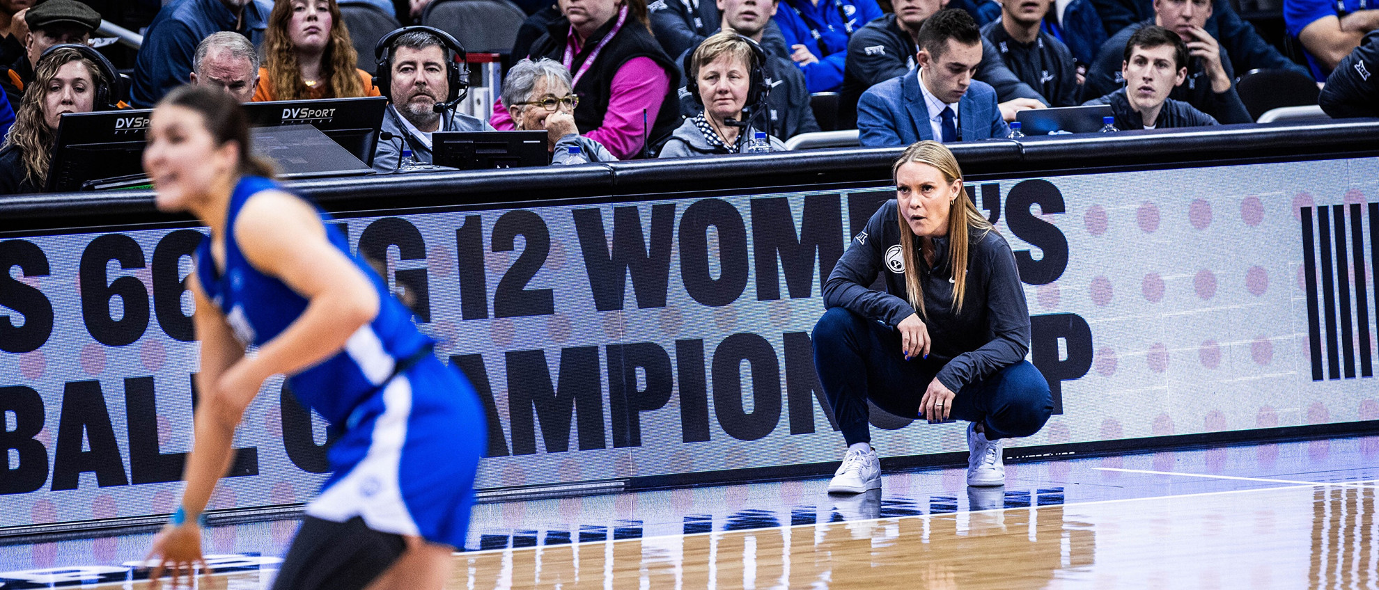 23-24wBKB BIGXII vs Kansas 214.jpg Amber Whiting looks on during BYU's women's basketball game against Kansas at the Big 12 Championship.