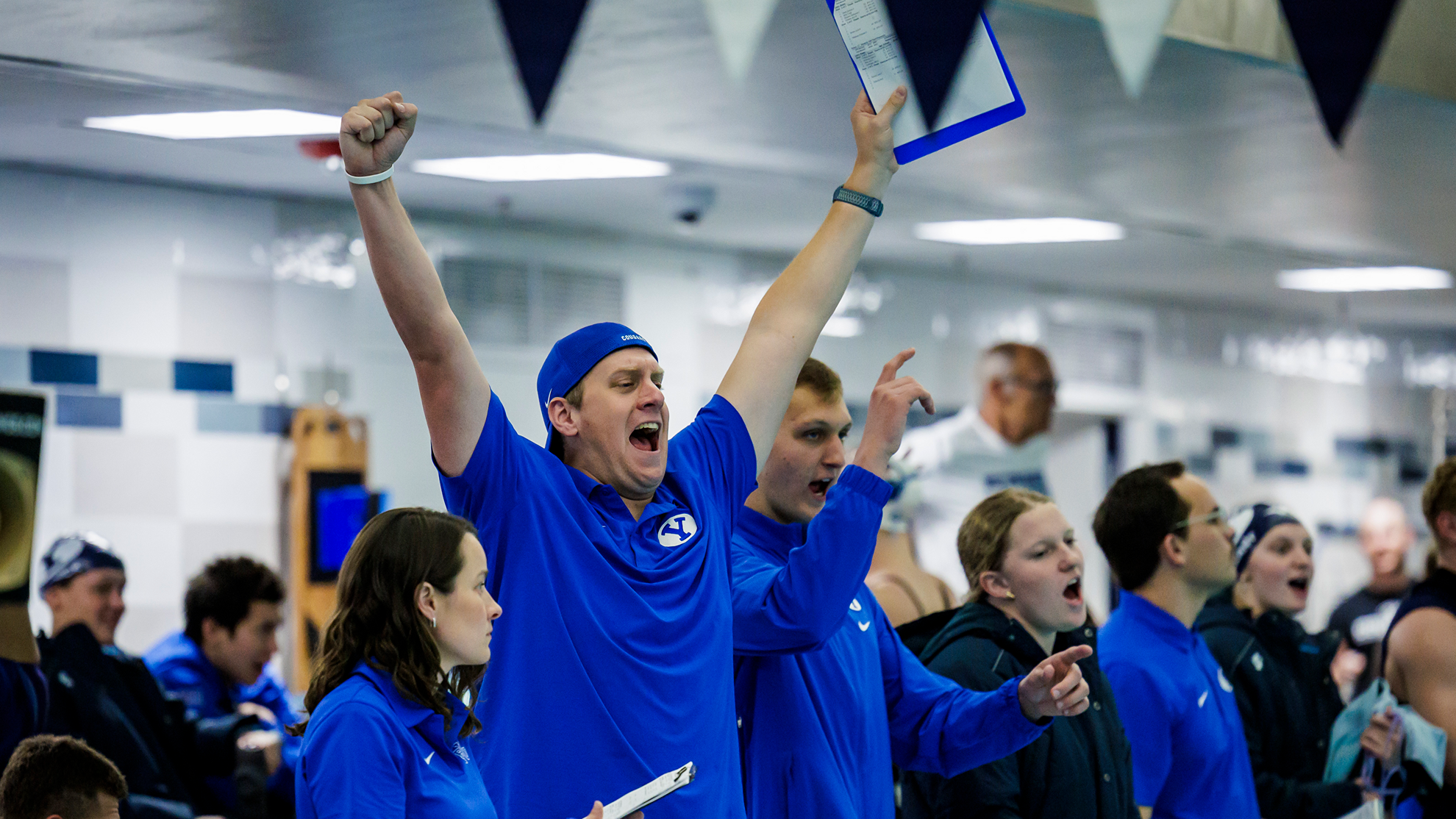 Hanslemann, ChristianUNLV.png BYU assistant swim coach Christian Hanselmann celebrates a race victory in the Cougars' meet versus UNLV on Nov. 2, 2024 at the Richards Building Pool.