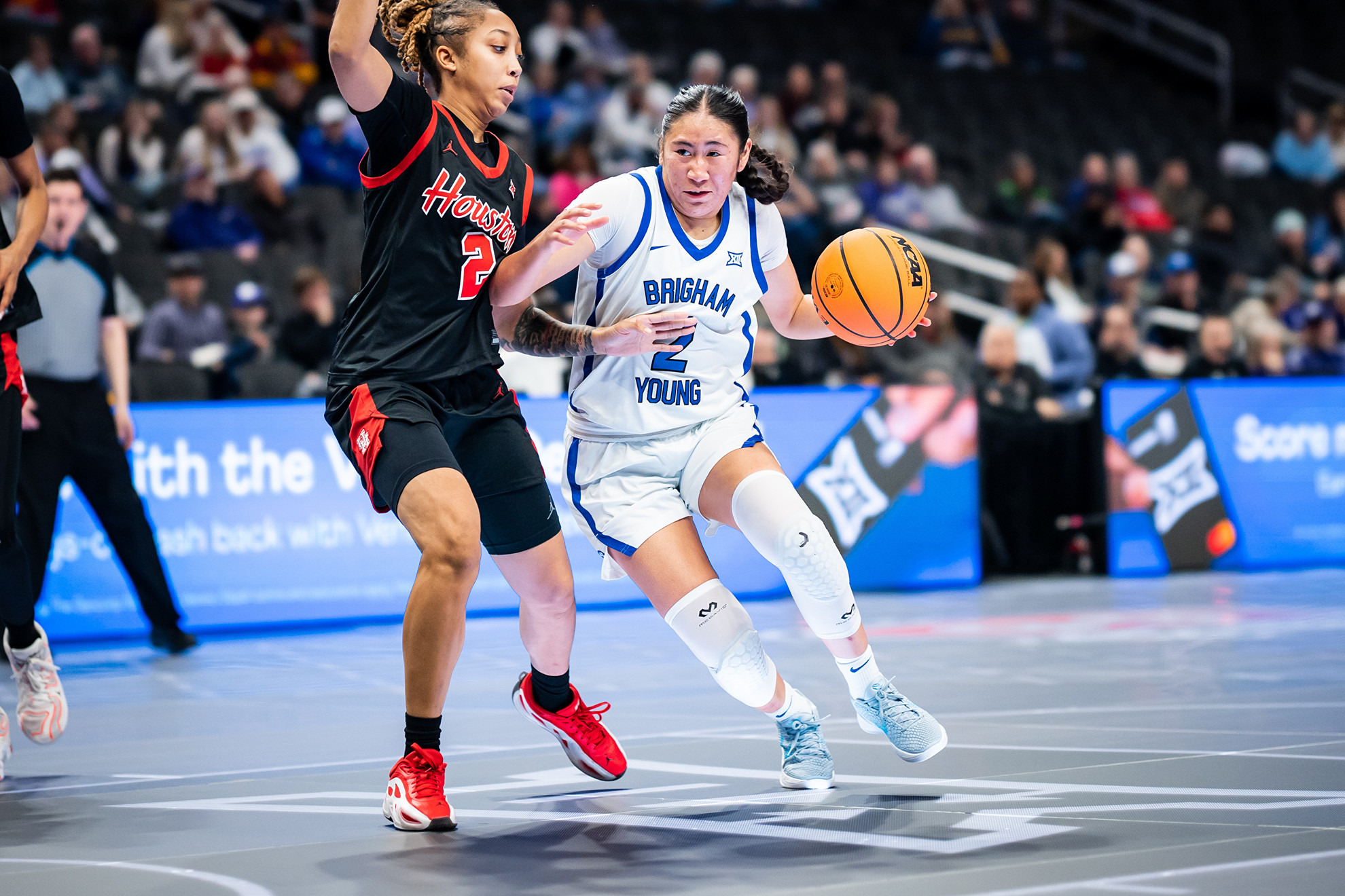 Sydney Benally drives to the basket during BYU's Big 12 Tournament game against Houston.
